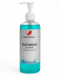 Natural Nectar Oud Wood Hand Wash in a clear plastic bottle with a white pump dispenser, showing the turquoise liquid inside, on a white background.