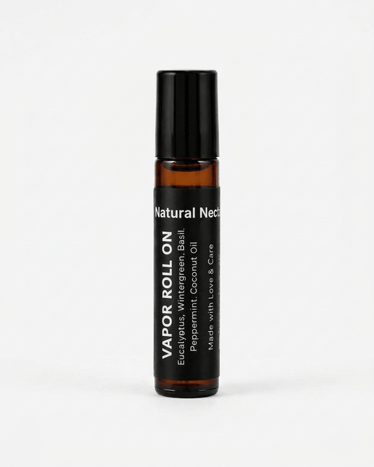 Natural Nectar Eucalyptus & Peppermint Vapour Roll-On bottle in lifestyle shot with cooling elements.