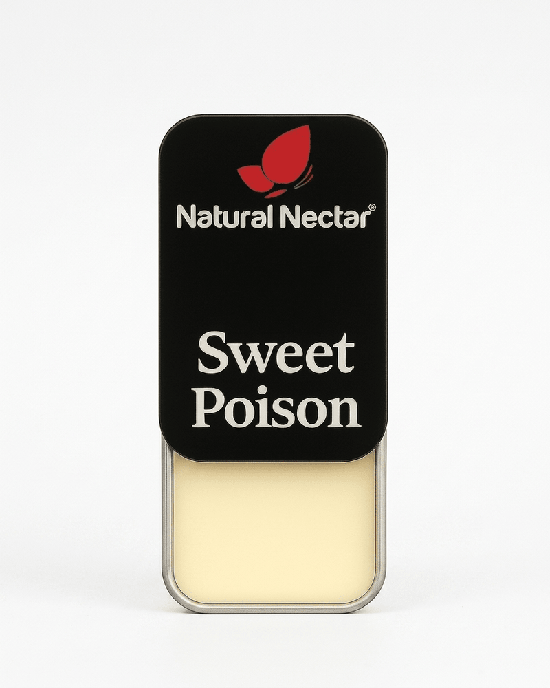 Natural Nectar Sweet Poison Fruity Floral Solid Perfume tin in lifestyle shot with floral styling.