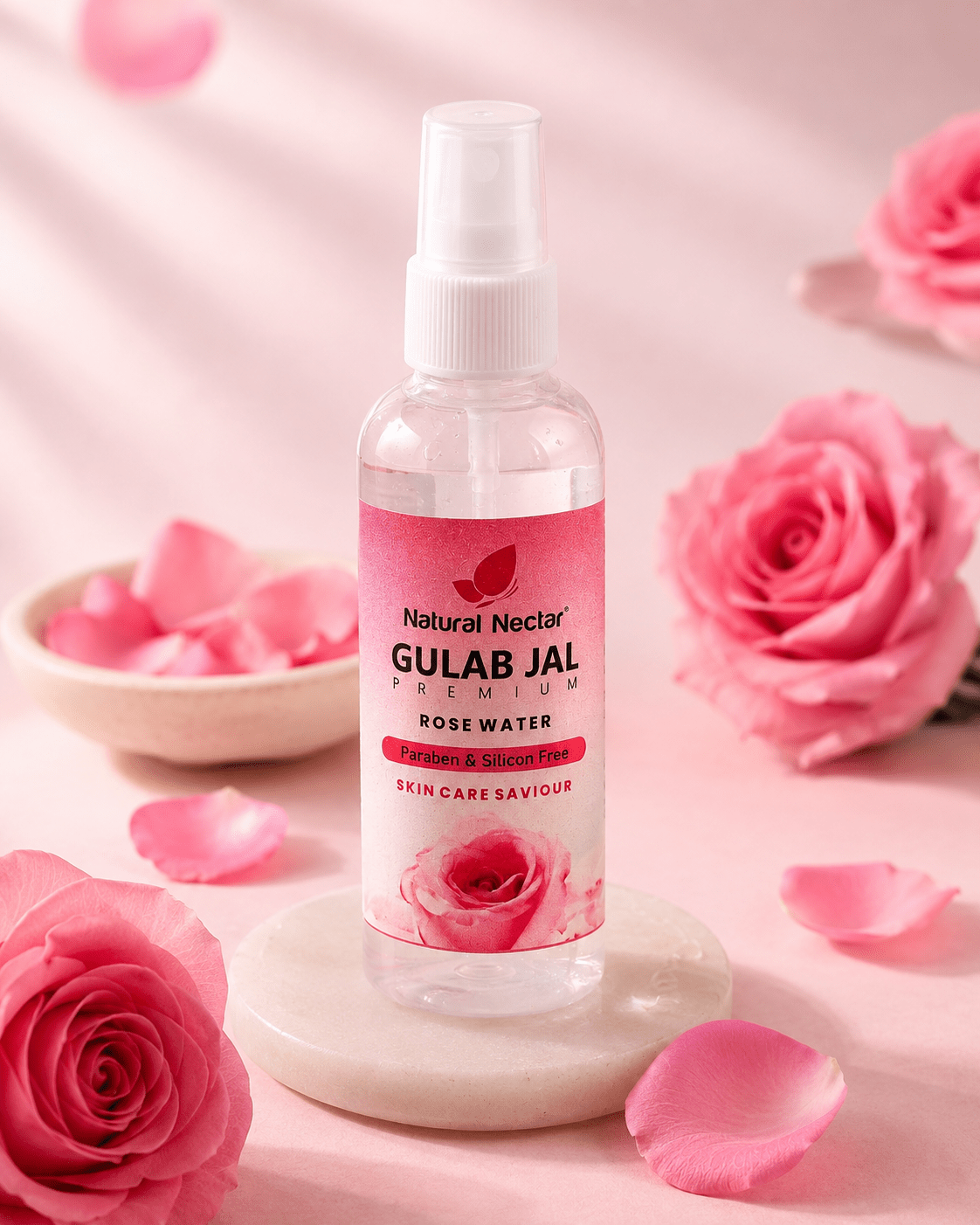 Natural Nectar Gulab Jal Rose Water Face Mist in lifestyle shot with rose theme and soft background.