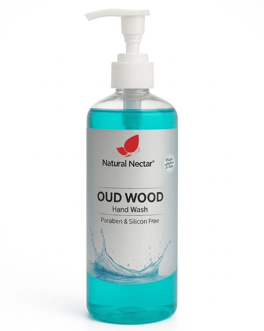 Natural Nectar Oud Wood Hand Wash in a clear plastic pump bottle with turquoise liquid visible inside on a white background.