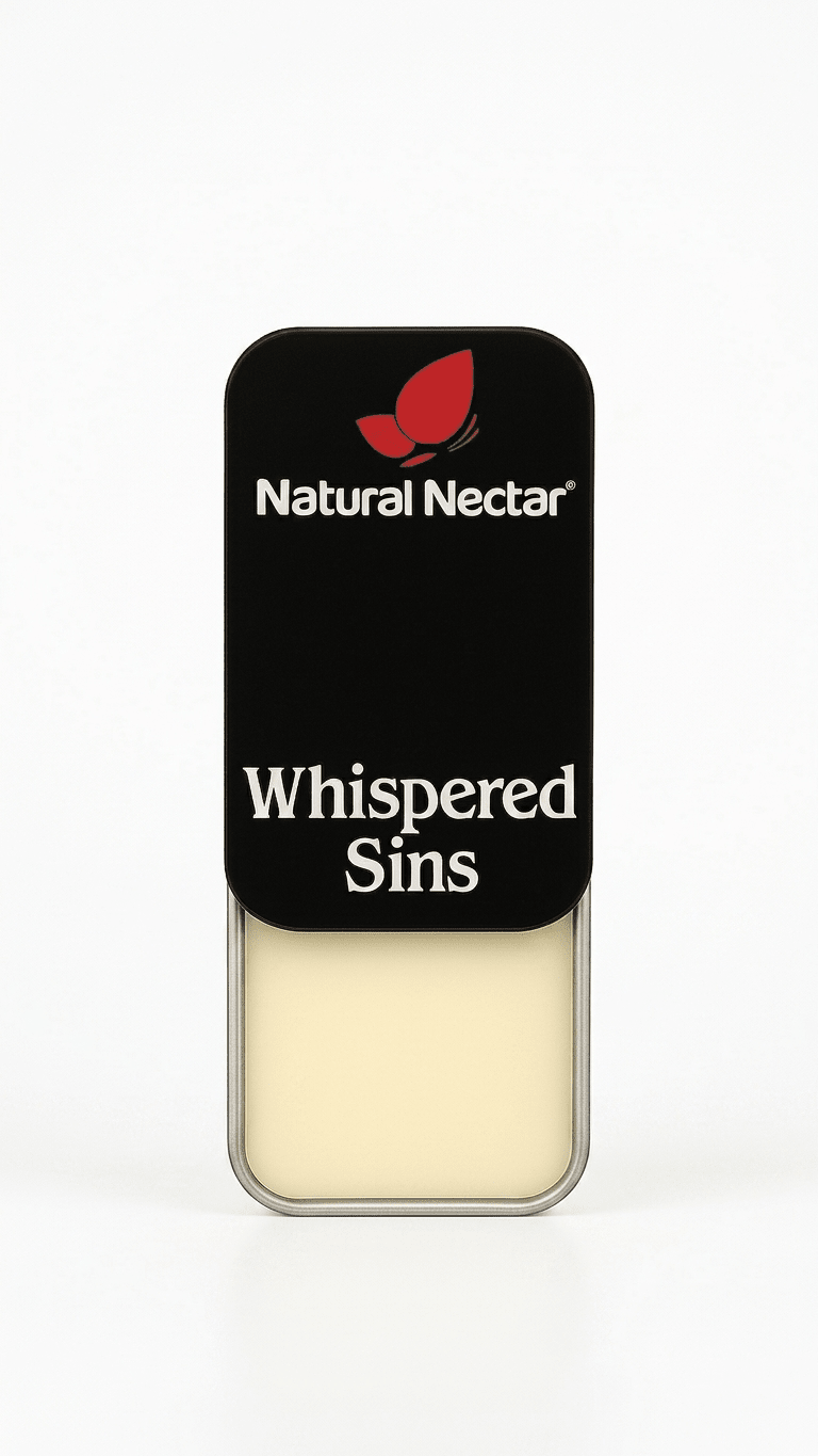 Natural Nectar Whispered Sins Patchouli Floral Solid Perfume tin in lifestyle shot with floral styling.