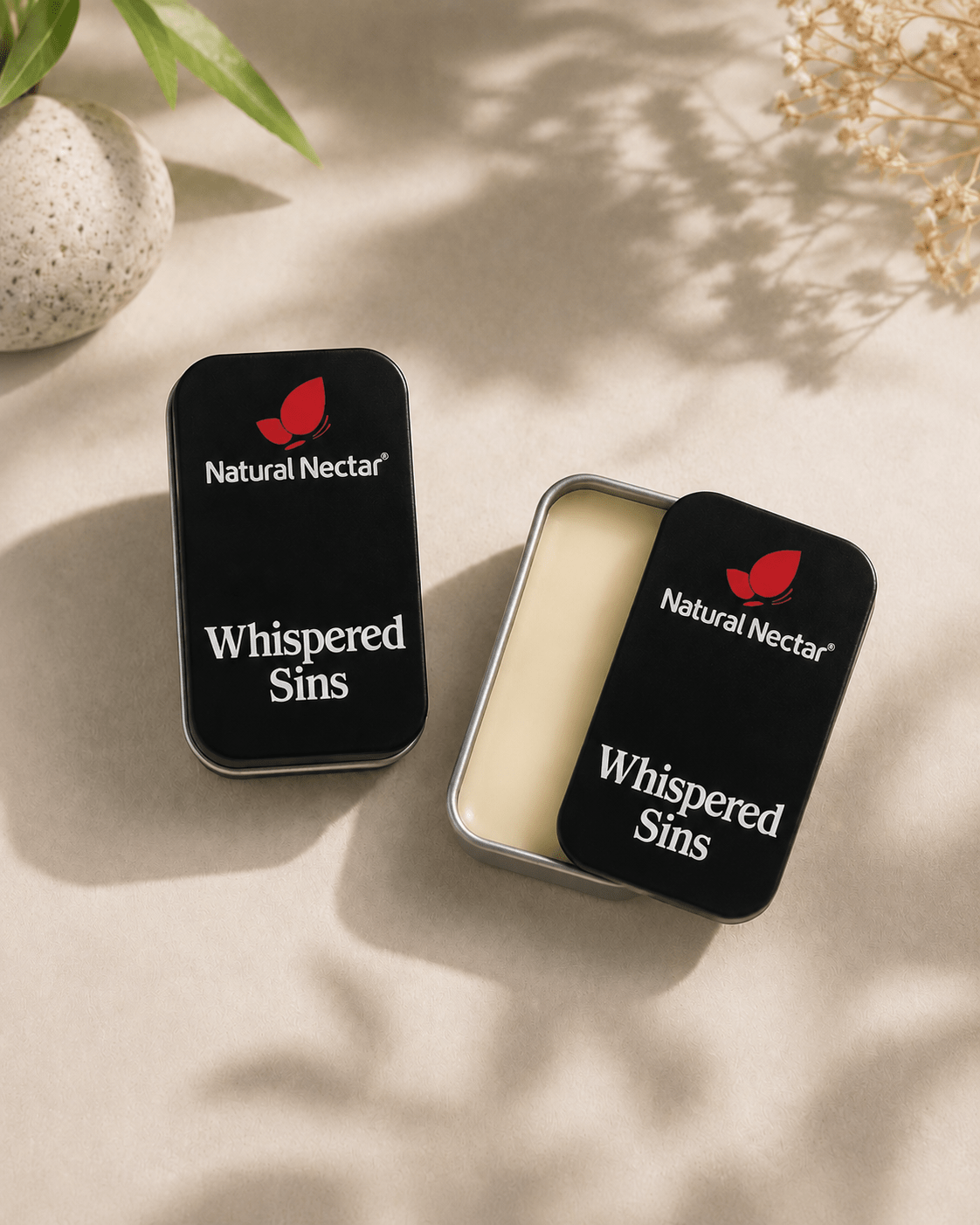 Natural Nectar Whispered Sins Patchouli Floral Solid Perfume product shot with clear packaging.