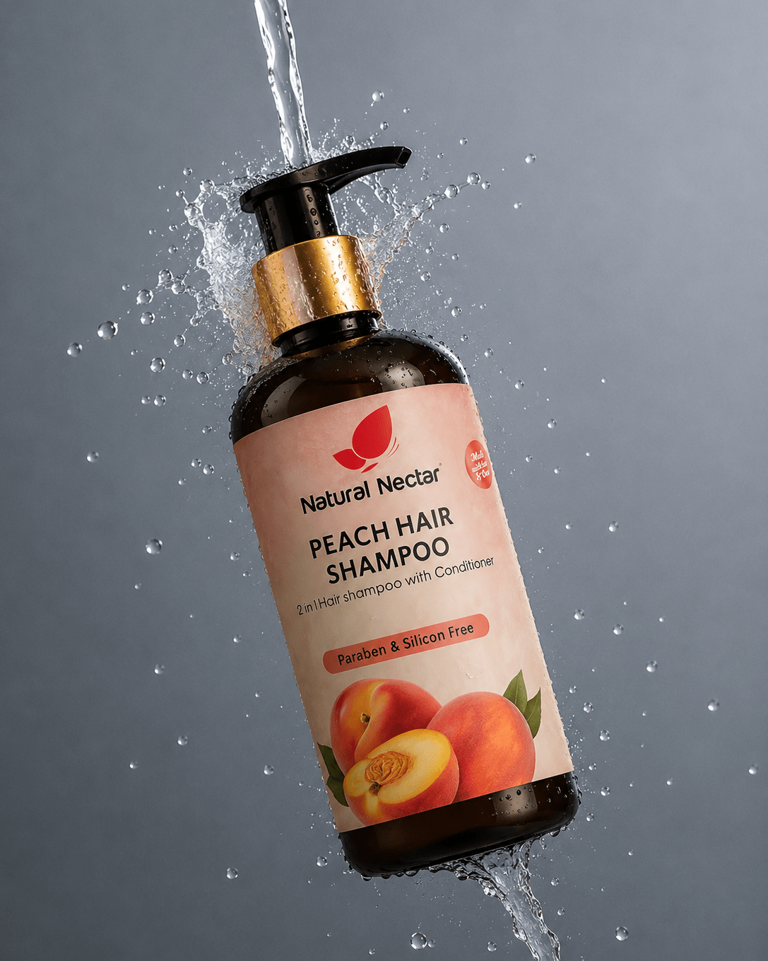 Natural Nectar Peach Shampoo bottle floating mid-air against a dark grey background with water spray and peach elements, dark brown bottle with gold collar.