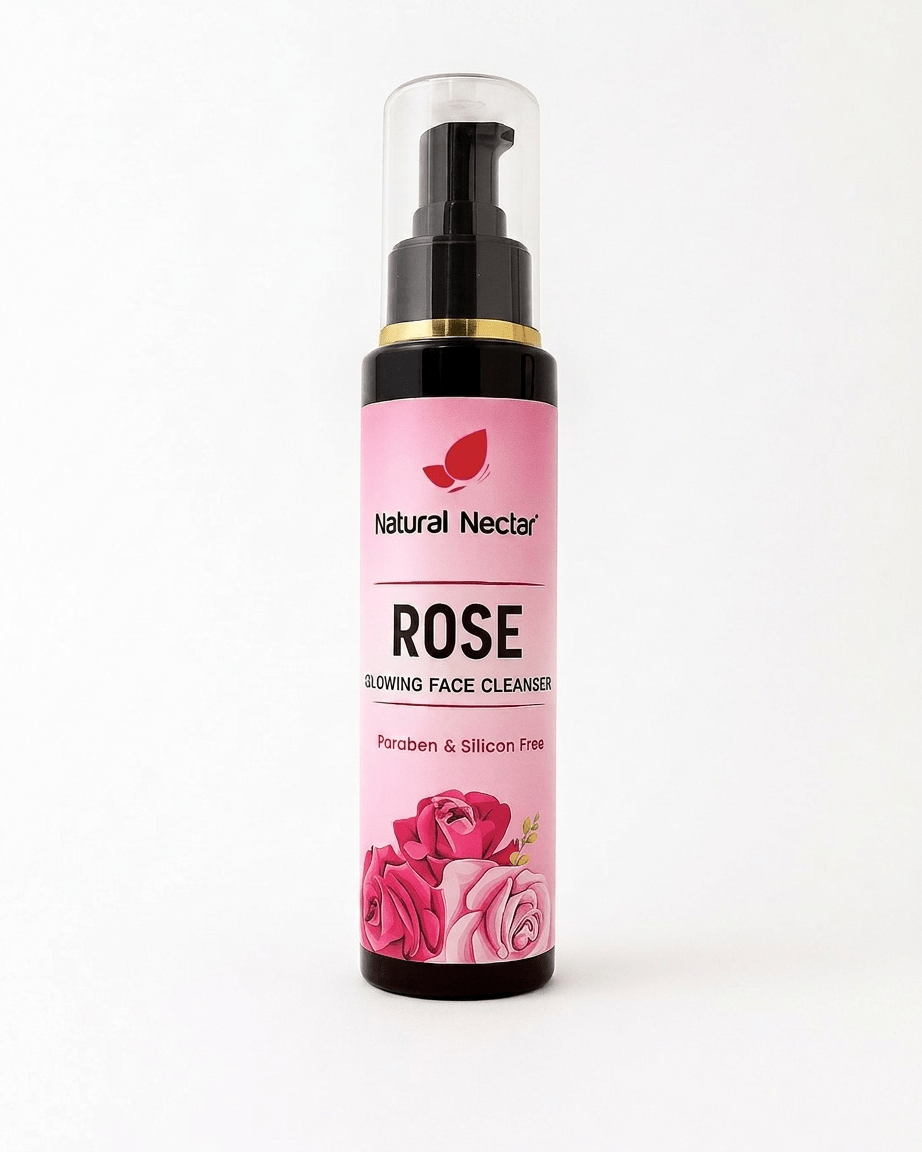 Natural Nectar Rose Glowing Face Cleanser in a black pump bottle with a gold collar and pink rose-illustrated label, shown upright on a plain white background.
