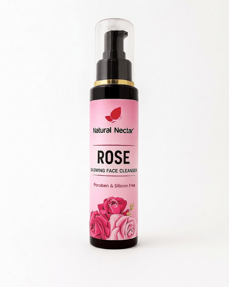 Natural Nectar Rose Glowing Face Cleanser in a black pump bottle with a gold collar and pink rose-illustrated label, shown upright on a plain white background.